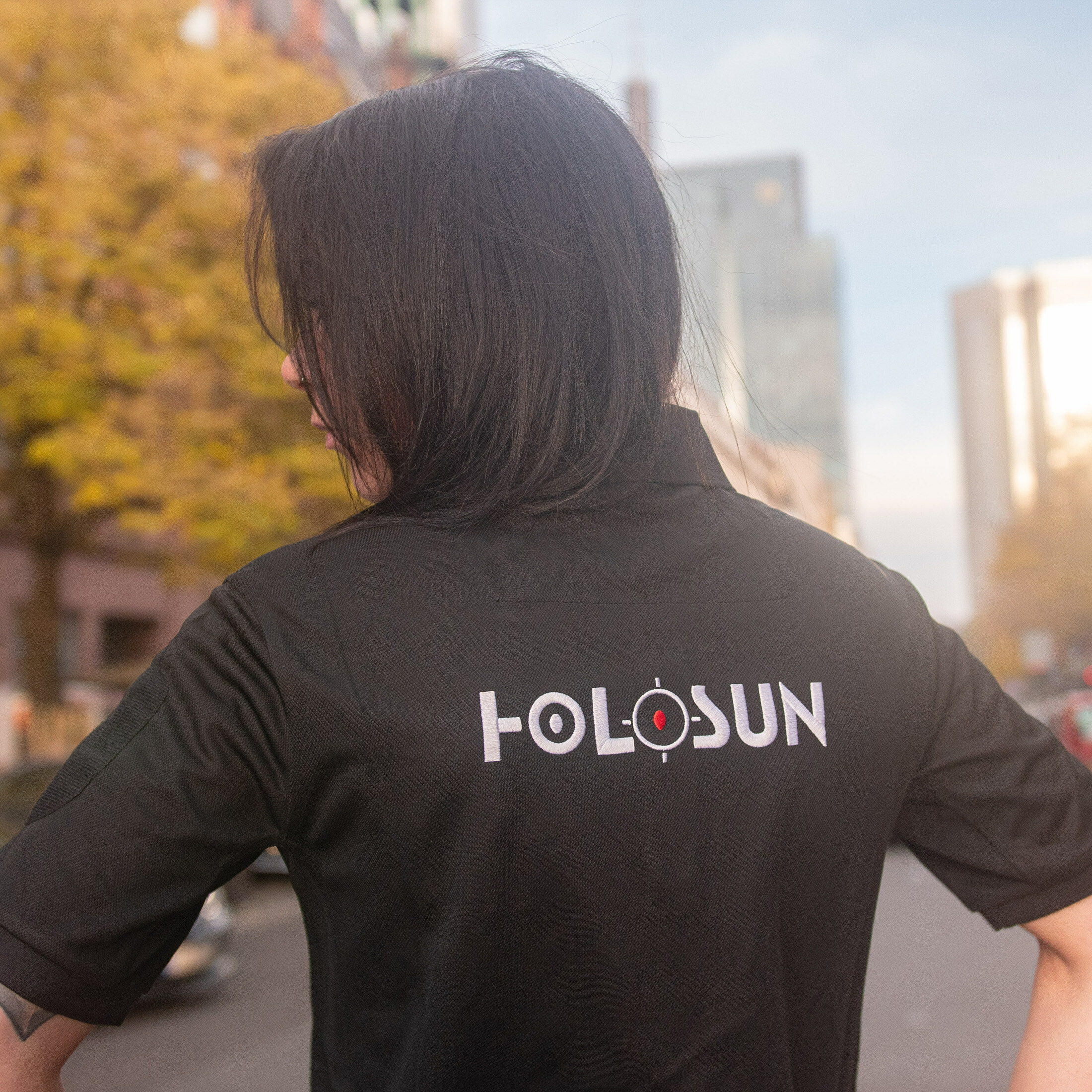 Polo shirt with embroidery of the Holosun logo on the front and back, cell phone pocket and Velcro …